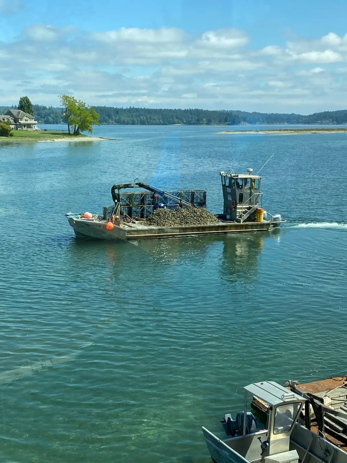 The barge running out under a blue sky