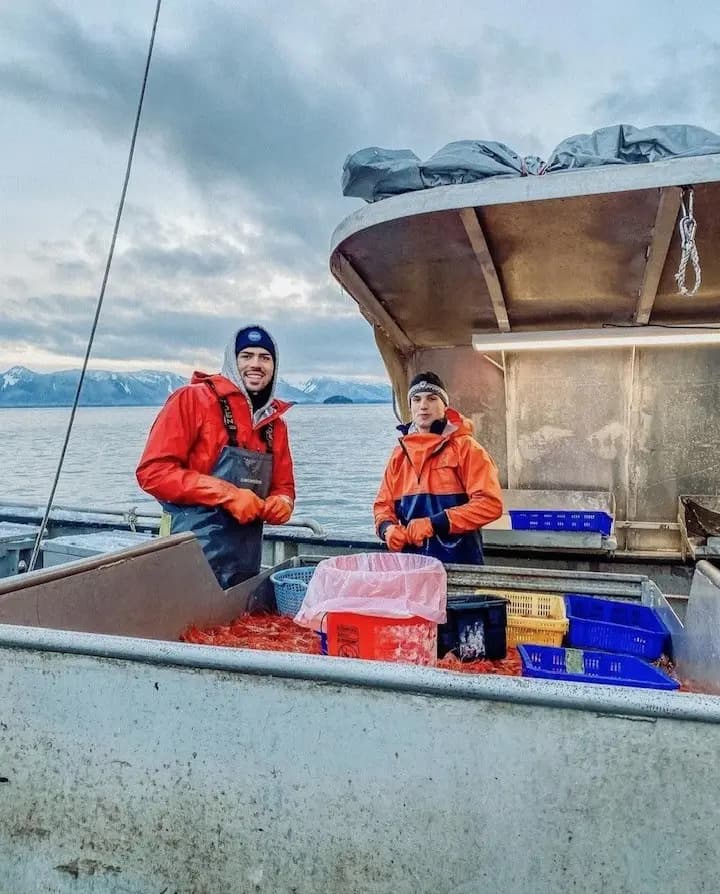 Two of the crew out on the water