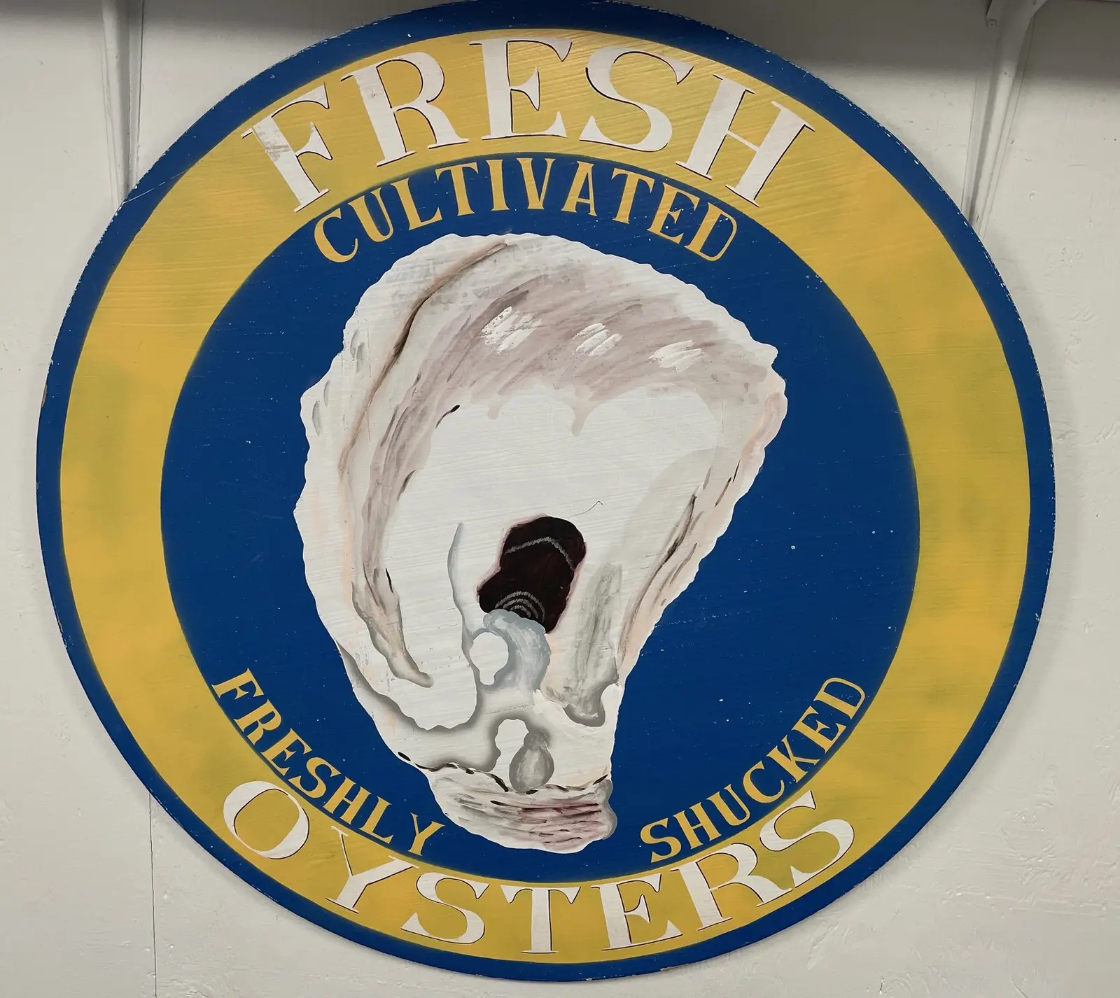 The hand-painted oyster sign